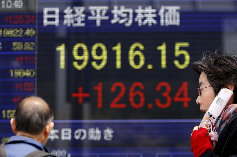 Asian stocks dip as tech rally cools; Japan scales new peaks