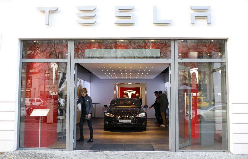 Chinese EV maker shares slide tracking Tesla sales drop