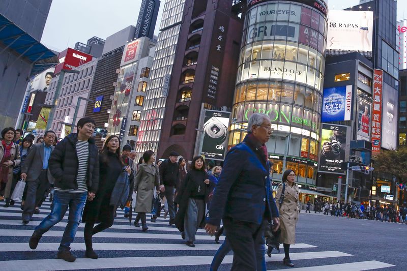 Japan GDP revised higher for Q4, economy ducks recession